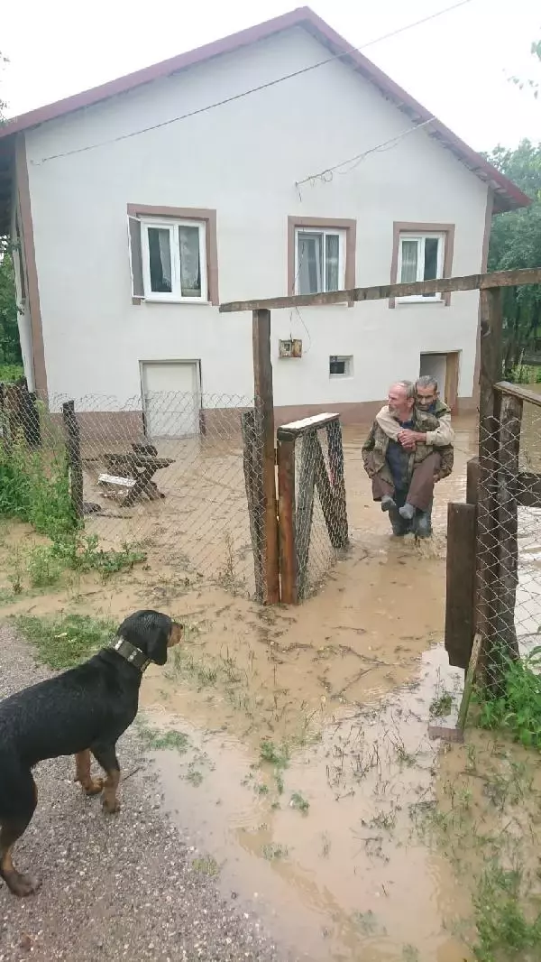 He carried his disabled neighbor on his back out of the flooded house