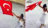 İş adina asılı Türk bayrağını koparıp çöpe atan kadın kameralara yakalandı İş adina asılı Türk bayrağını koparıp çöpe atan kadın kameralara yakalandı