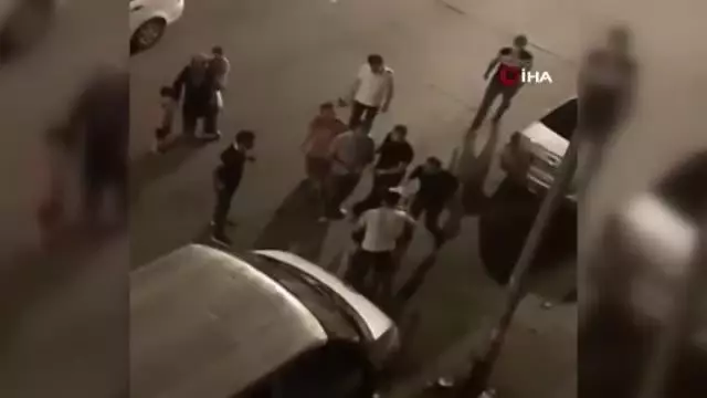 Eşine şiddet uyguladığı için darp edilmek istenen adam, yine eşinin arkasına saklandı