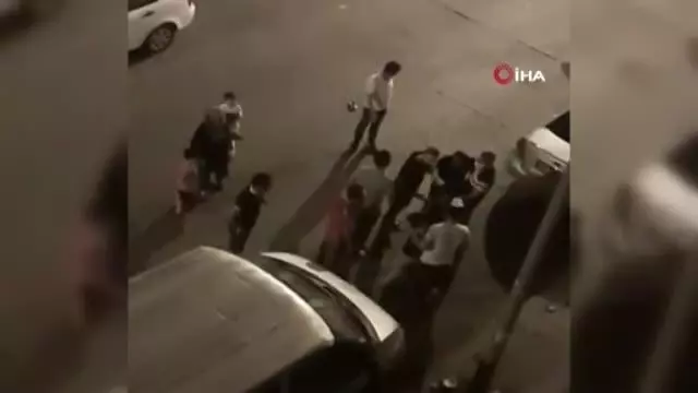 Eşine şiddet uyguladığı için darp edilmek istenen adam, yine eşinin arkasına saklandı
