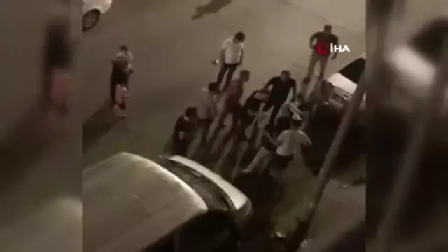 Eşine şiddet uyguladığı için darp edilmek istenen adam, yine eşinin arkasına saklandı
