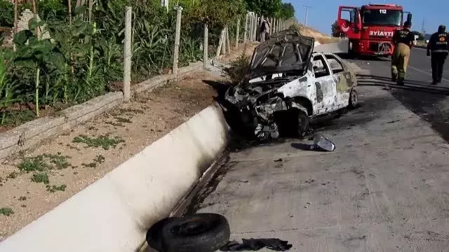 Devrilerek alev alan otomobilin sürücüsü yaralandı