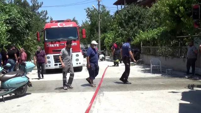 Yaşlı kadını banyoda yakalayan yangına vatandaş kafasına tencere geçirip müdahale etti