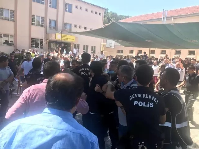 Baba ve oğulun yarıştığı seçimde üyeler birbirine girdi
