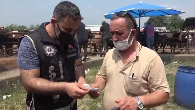 Düzce emniyetinden hayvan pazarlarında besici ve müşterilere sahte para uyarısı