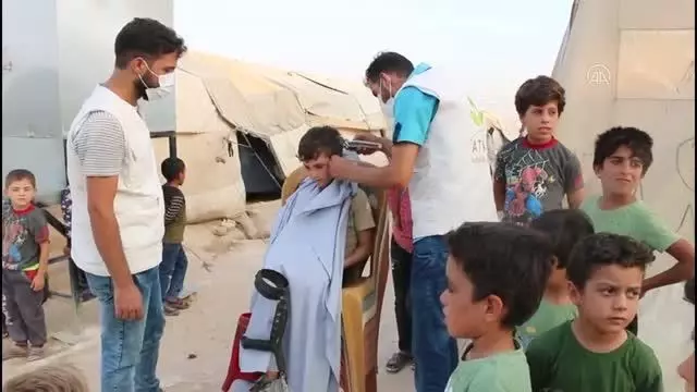 Son dakika haberleri! SSuriye'nin kuzeyindeki Bab'da kamplarda kalan çocuklar bayram tıraşı oldu Son dakika haberleri! SSuriye'nin kuzeyindeki Bab'da kamplarda kalan çocuklar bayram tıraşı oldu