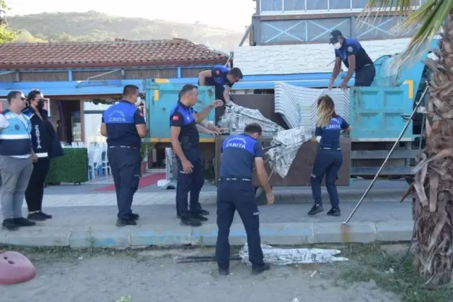 Süleymanpaşa'da plajda izinsiz kiralanan şezlonglar toplandı