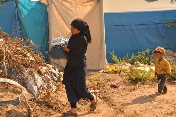 The unsung heroes of agriculture welcomed the Eid al-Adha by working in the heat of Adana