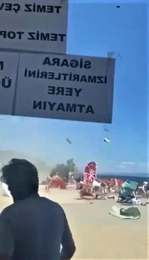 ALTINOLUK'TA KISA SÜRELİ FIRTINA PANİĞE NEDEN OLDU