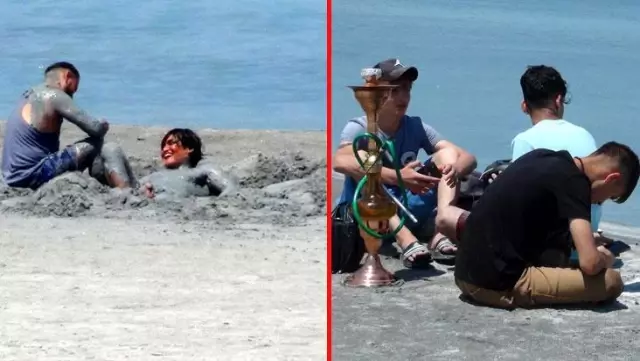 Görüntüler pes dedirtti! Yasağa aldırış etmeyen vatandaşlar Salda Gölü'nde nargile içip çamur banyosu yaptı Görüntüler pes dedirtti! Yasağa aldırış etmeyen vatandaşlar Salda Gölü'nde nargile içip çamur banyosu yaptı