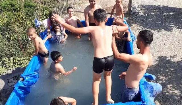 Traktör römorkunu havuza çevirdiler