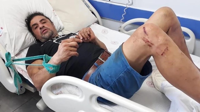 Kaza sonucu hastaneye kaldırılan adamı eli ve ayağından yatağa bağladılar