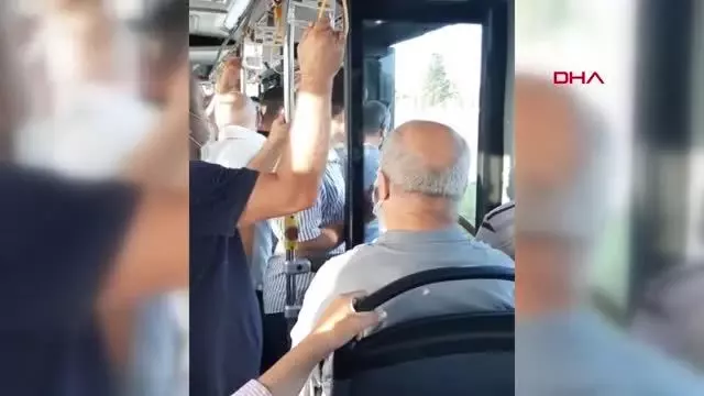Son dakika haberleri! OTOBÜSTE YOLCULAR ARASINDAKİ MASKE TARTIŞMASI KAMERADA