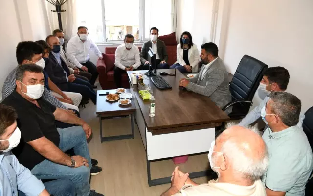 AK Parti'li Turan'dan MHP'ye ziyaret