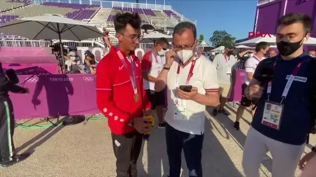 SPOR Cumhurbaşkanı Erdoğan, olimpiyat şampiyonu milli okçu Mete Gazoz'u telefonla arayarak tebrik etti