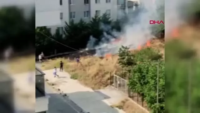 YANGIN AĞAÇLIK ALANA SIÇRAMASIN DİYE MÜCADELE EDEN MAHALLELİLER KAMERADA