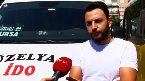 MİNİBÜSÜN ARKA KOLTUĞUNDA SAKLANDI, ŞOFÖR İNİNCE PARALARI ÇALDI