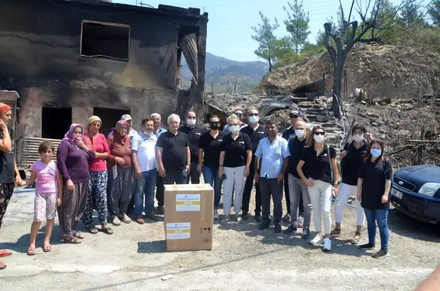 Lider Özgan, yangın mağdurlarına yardım gereci dağıttı