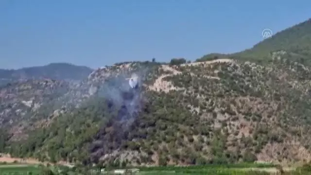 Dalaman Havalimanı yakınlarında çıkan orman yangını kontrol altına alındı