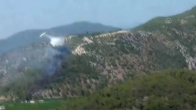 Dalaman Havalimanı yakınlarında çıkan orman yangını kontrol altına alındı