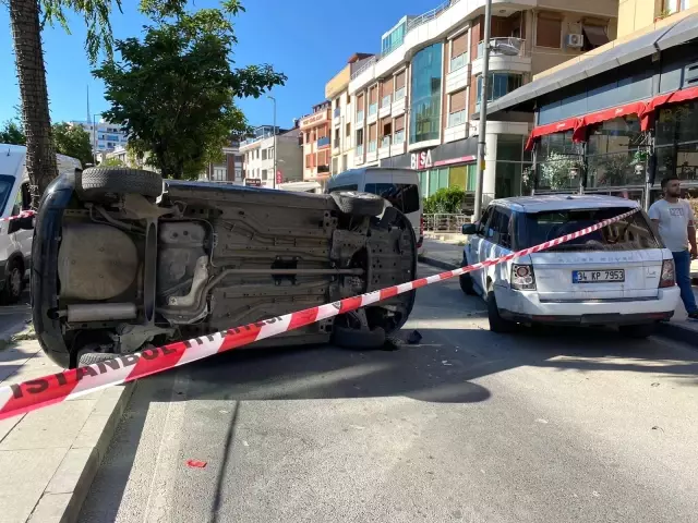 Ataşehir'de park halindeki cipe çarpan otomobil yan yattı