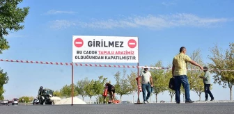 Almanya'da yaşayan Türk vatandaşı, Konya'daki arsasından geçen yolu tabelayla kapattı