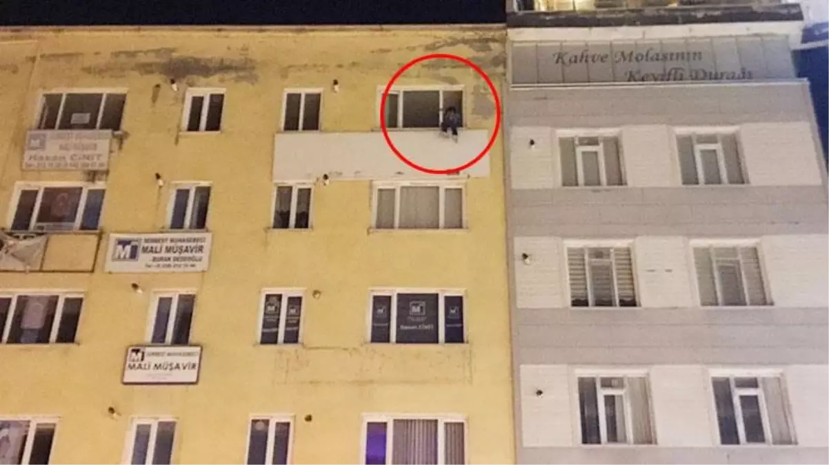 5'inci katta çıkarak intihar kalkışan adamı, olay yerine gelip dil döken karısı vazgeçirdi