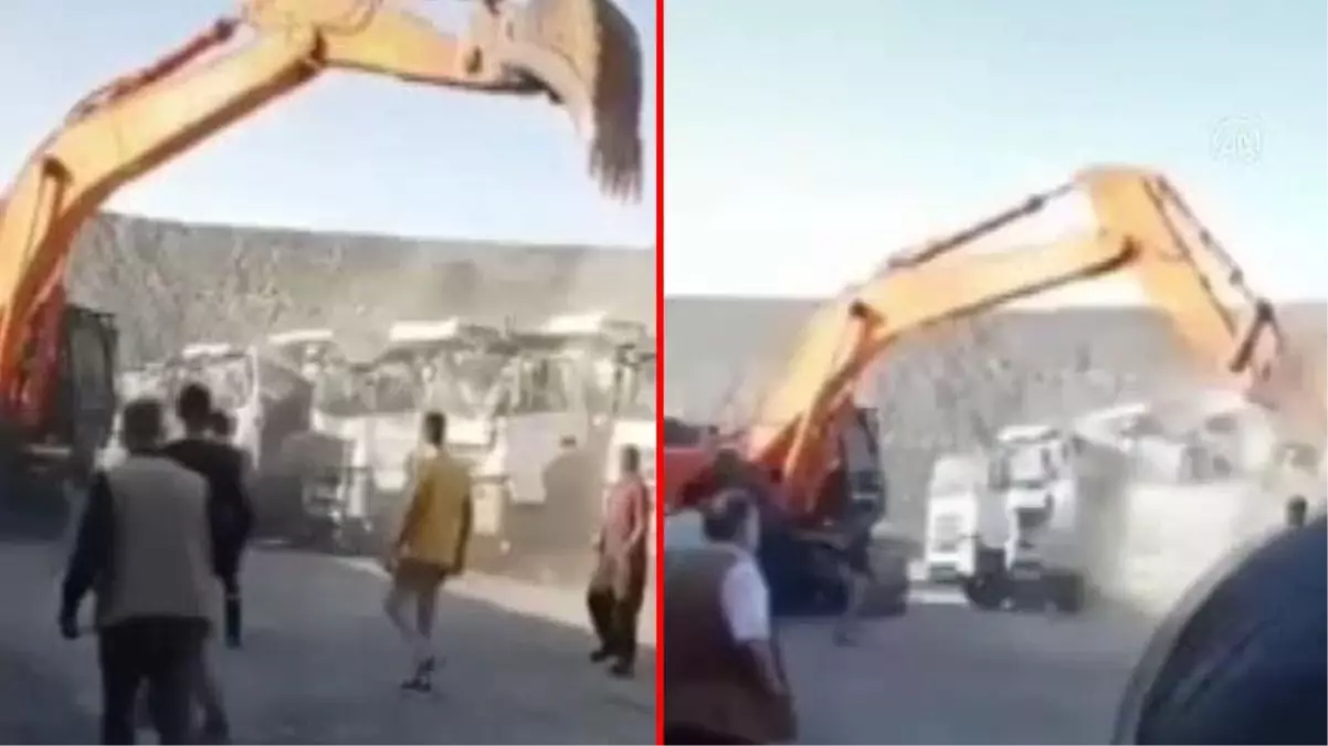 Ücretini alamayan işçi iş makinesiyle kamyonları parçaladı! Olay anı kamerada