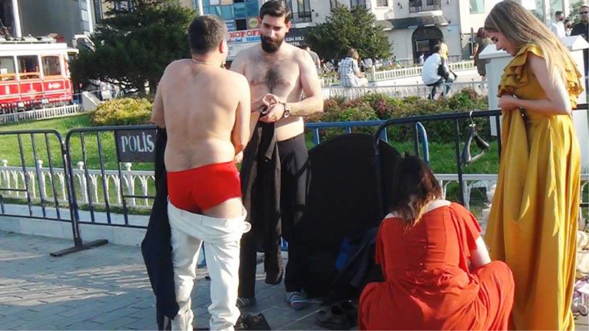 Taksim'de şaşırtan görüntüler! İranlı çiftler meydanda kıyafet değiştirip fotoğraf çektirdi