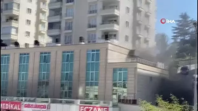 Zemin katta çıkan yangında bina sakinleri itfaiye merdiveniyle tahliye edildi
