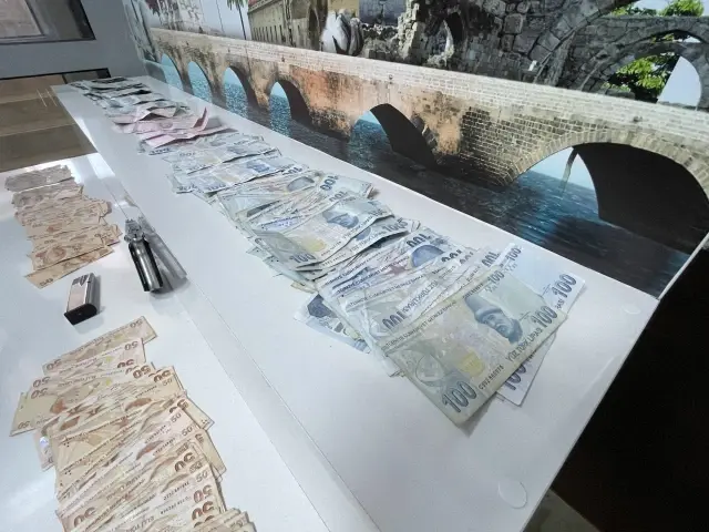 Kar maskeli gasp zanlısını yürüyüşü ele verdi