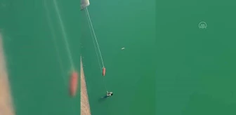 Köprüden göle düşen kadın balıkçı teknesiyle kurtarıldı
