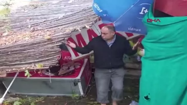 TARİHİ ÇINARIN KIRILAN DALLARI BİR DÜKKANIN SUNDURMASINDA HASARA NEDEN OLDU