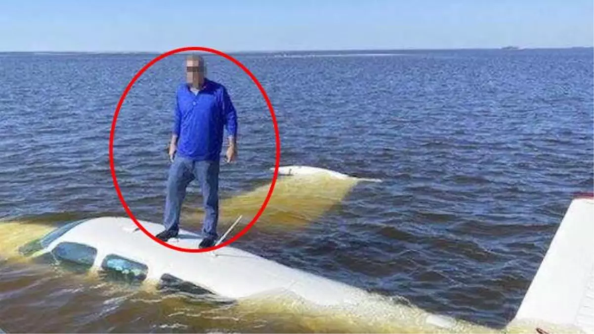Mucize kurtuluş! Yetkililer, batmak üzere olan uçağın üzerindeki pilotu son anda fark etti