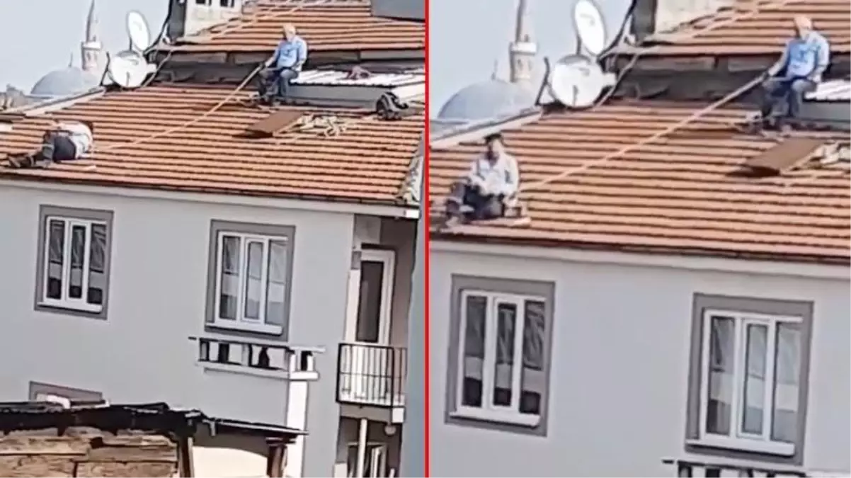 Yok böyle tedbir! Çatı tamircisi, beline bağladığı ipin ucunu kendisini izleyen arkadaşına verdi