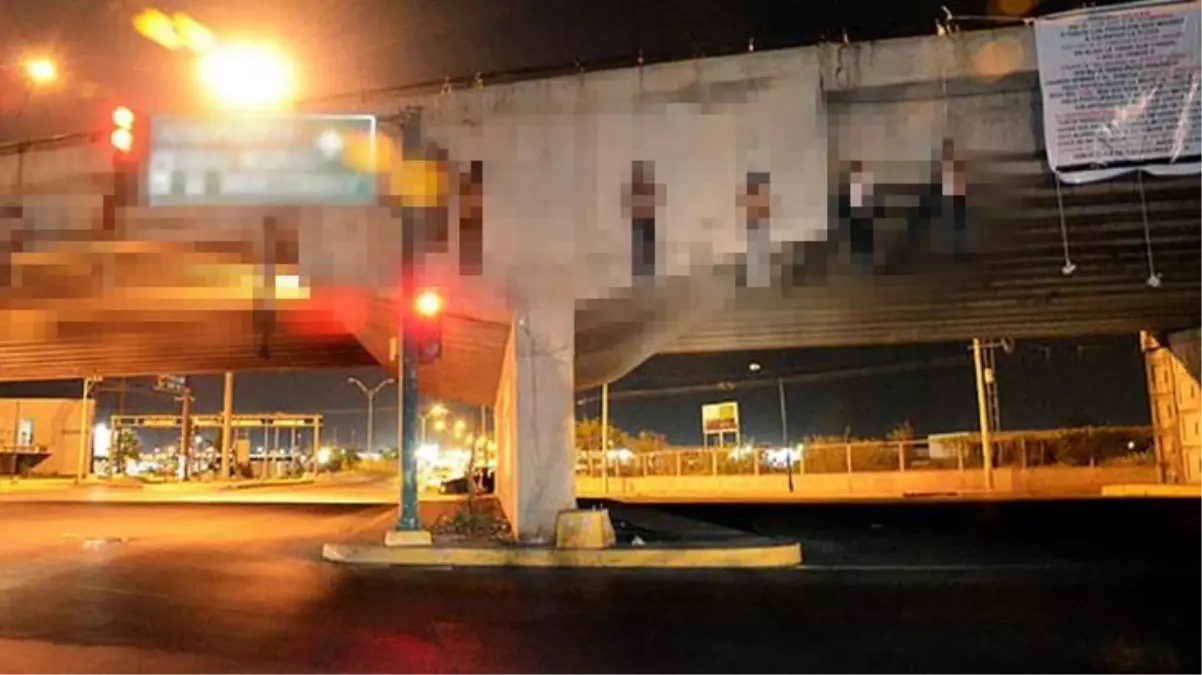 Meksika'da 9'u üst geçitten sallandırılmış halde olmak üzere 10 cansız beden bulundu