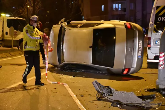 park halindeki araca carparak devrilen otomobilin surucusu yaralandi