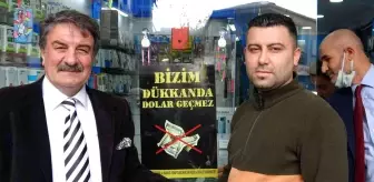 Pendik'te kapı kapı dolaşan grup, esnafı doları boykot etmeye davet etti