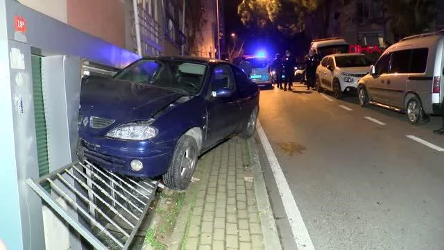 IN ISTANBUL-KADIKÖY, THE CAR OVER THE IRON GUARDS HAS BEEN HANGED ON THE WALL OF THE BUILDING