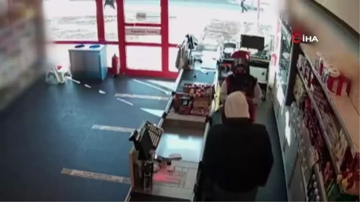 Markette cerrahi maske ile hırsızlık kamerada