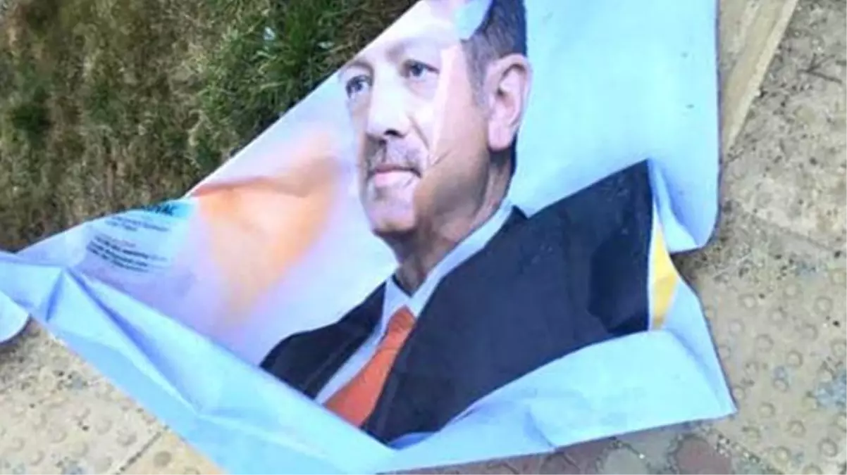 Cumhurbaşkanı Erdoğan'ın afişlerini yırtan şahıs gözaltına alındı