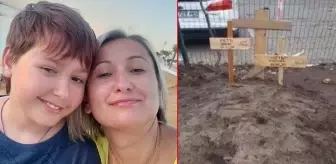 Rus bombardımanında ölen Ukraynalı anne ve oğul yaşadıkları sitenin bahçesine gömüldü