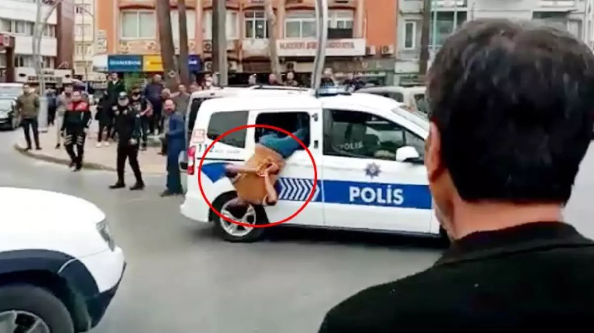 Gözaltına alınan zanlı, polis aracının camından kendini dışarıya attı! O anlar kamerada