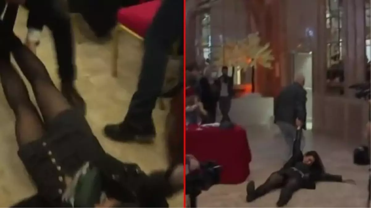 Fransa'da Le Pen protestosu! Kadın eylemciyi salondan yerde sürükleyerek çıkardılar