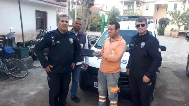 Belediye işçisinin bulduğu para dolu çantanın sahibi kırmızı bültenle aranan uyuşturucu kaçakçısı çıktı