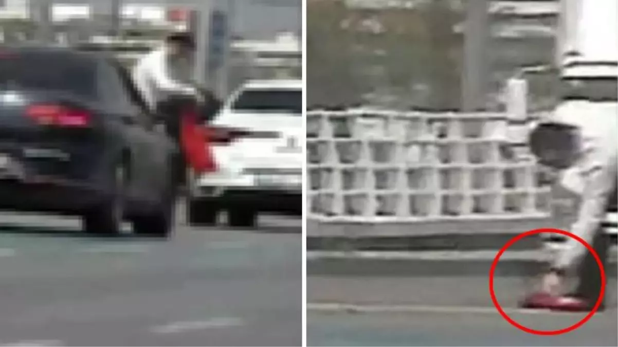 Trafikte aracını durdurup yerdeki Türk bayrağını aldı