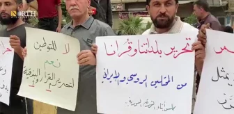 Türkiye'nin Suriye'deki mülteciler için yerleşim yeri inşa etme kararı Afrin'de protesto edildi