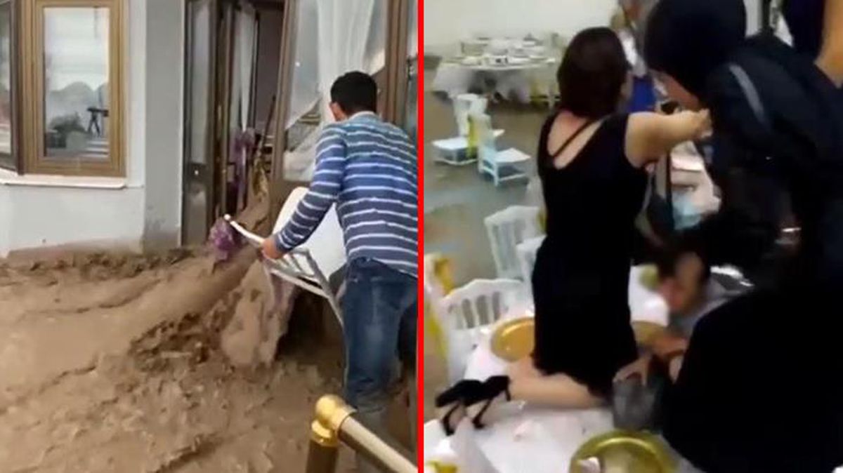 Burdur'da sele düğünde yakalanan vatandaşlar, masalarının üzerine çıkarak canlarını kurtardı