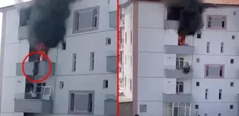 Alevlere teslim olan daireden aşağı atlayan kadın, alt kattaki komşusu tarafından havada yakalandı
