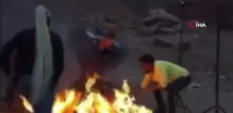 Fotoğraf çekiminde mankenin elbisesi yandı